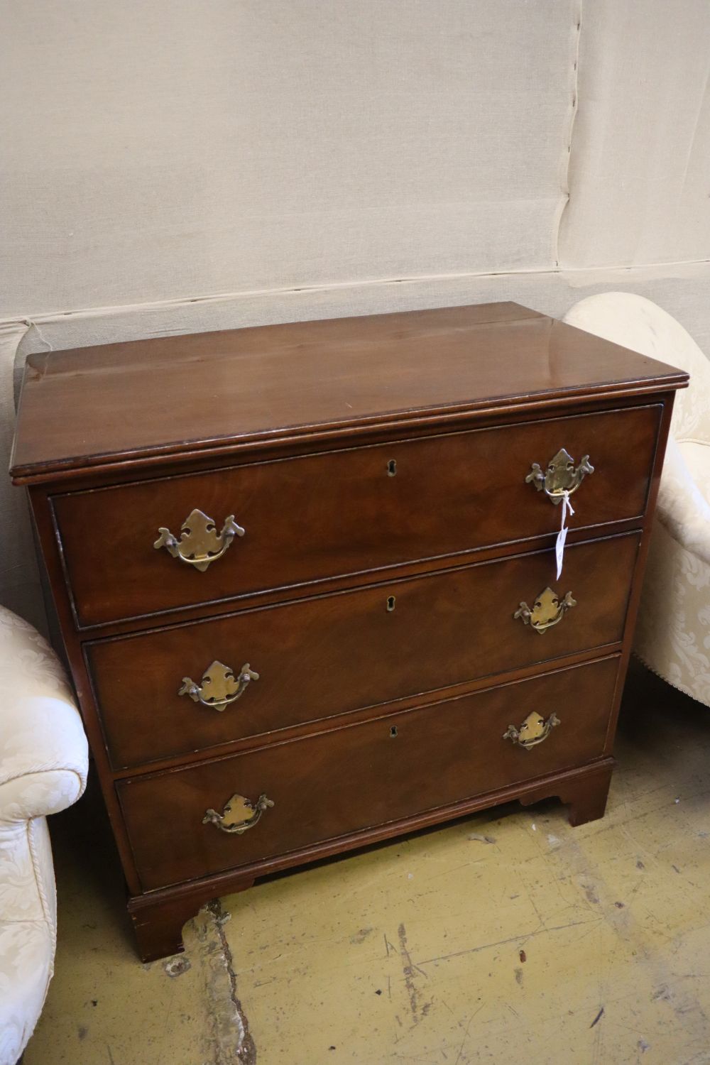 An Edwardian George III style mahogany chest of three drawers, width 87cm